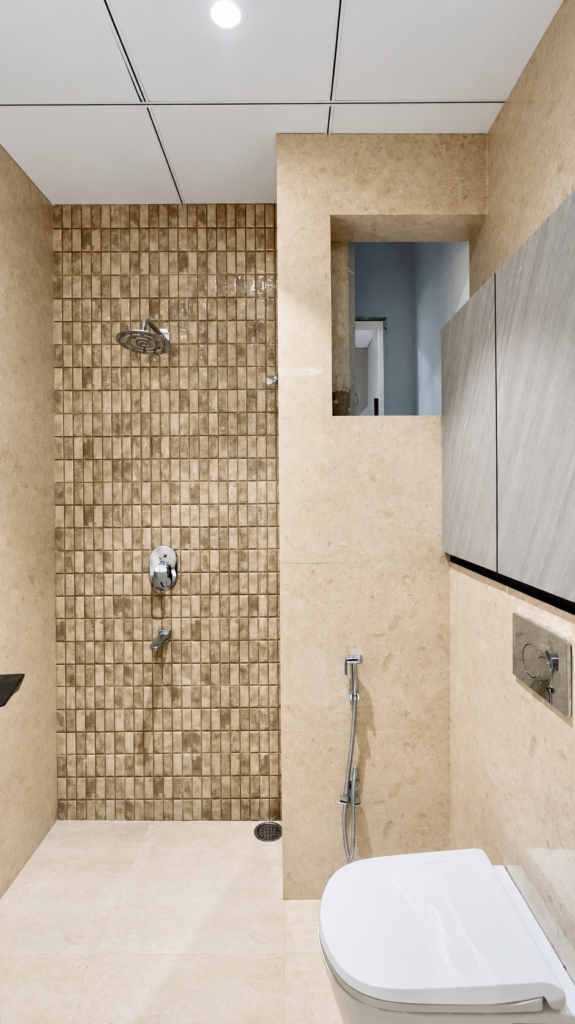Bathroom with textured tiles glass shower, Ashiyana Colony, Lucknow