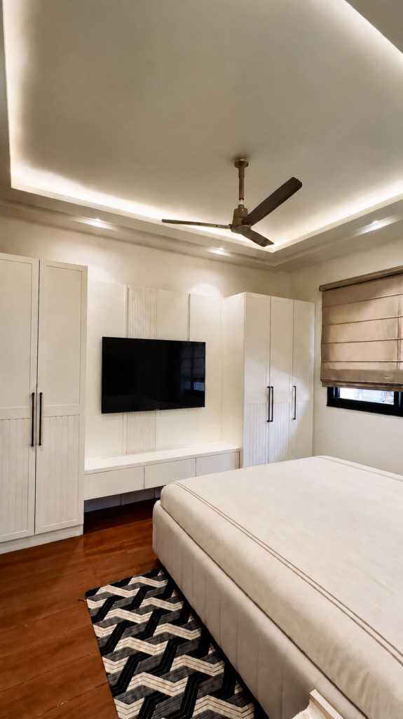 Bedroom with TV wall white cabinetry, Ashiyana Colony, Lucknow