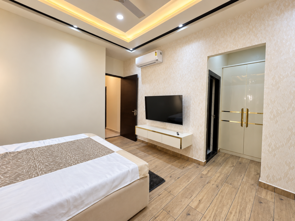 Bedroom with TV wall white floating console, Hind Nagar, Kanpur Road, Lucknow