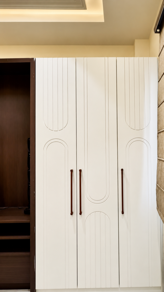 Bedroom with white wardrobe arched detail, Ashiyana Colony, Lucknow