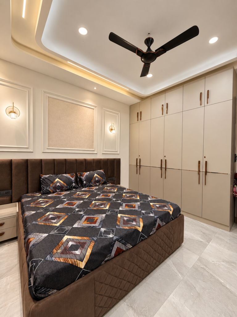 Bedroom with white wardrobe and dark bedding, Vijay Nagar home interior, Lucknow