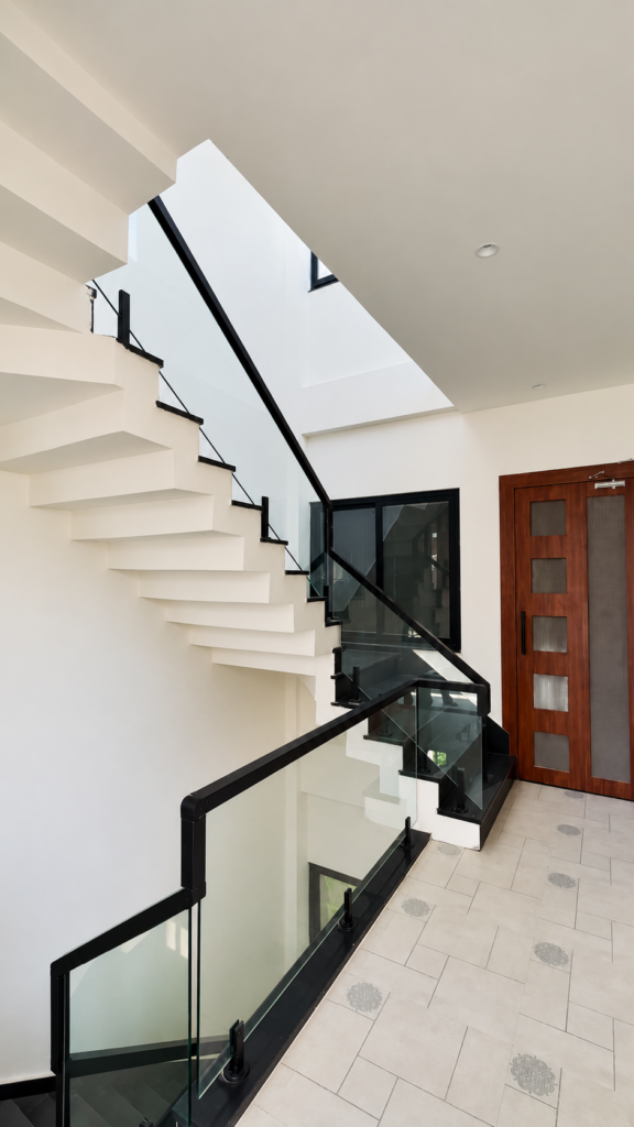 Interior staircase with glass railing, Ashiyana Colony, Lucknow