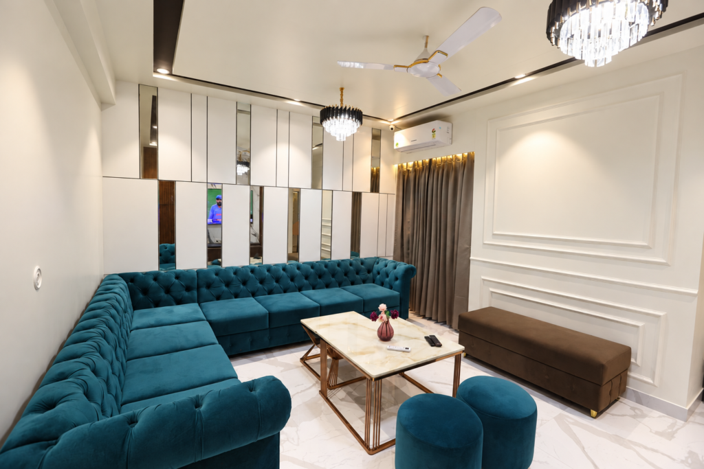 Living room with blue sectional mirrored partition, Vrindavan Yojna, Lucknow