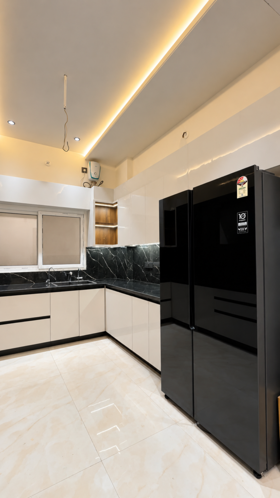 Modular kitchen with black refrigerator, Telibagh, Lucknow