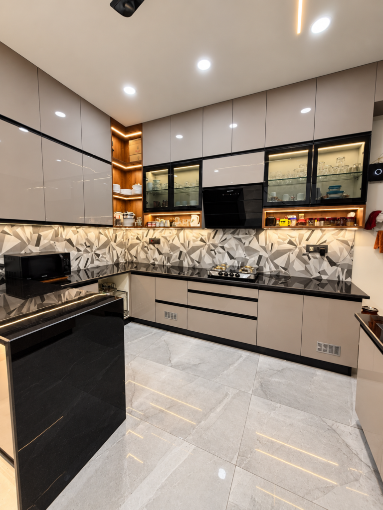 Modular kitchen with glass-front cabinets and black countertop, Vijay Nagar, Lucknow