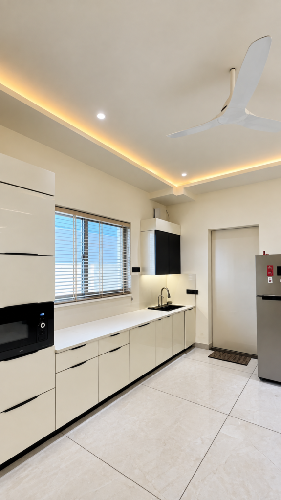 Modular kitchen with white countertop window, Sarojini Nagar, Lucknow